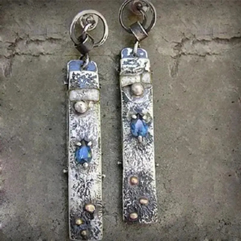 Handmade earrings made of blue stone