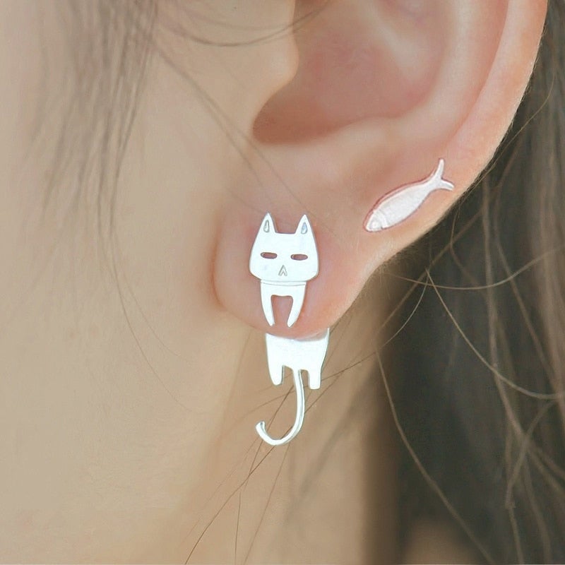 Silver earrings with fish and climbing cat