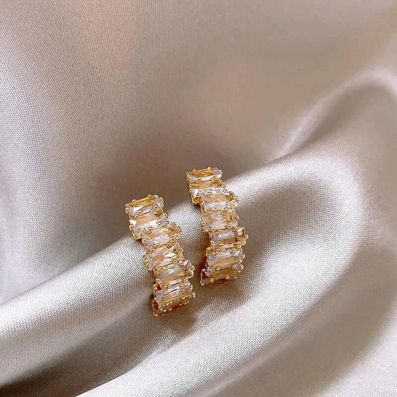 Elegant earrings with zirconia inlays