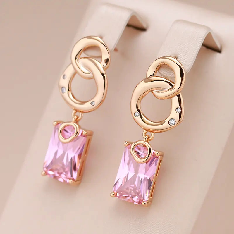 Small earrings with crystals in gold