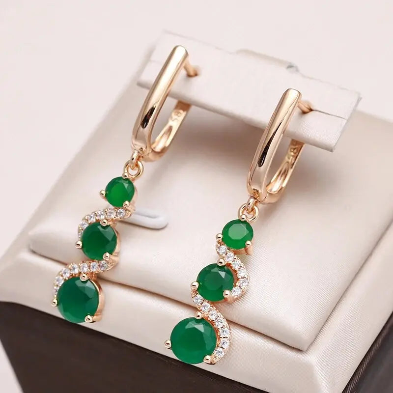 Elegant earrings with golden zirconia