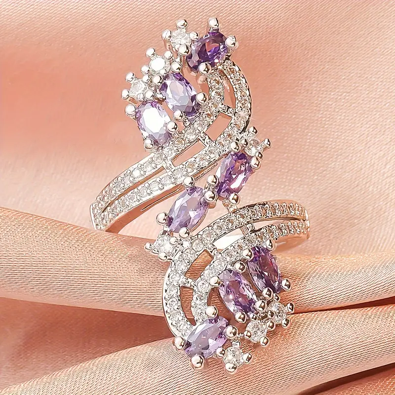 Elegant spiral ring with zirconia and purple crystal