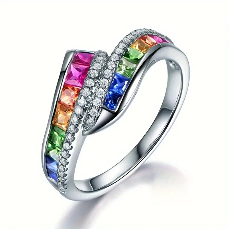Twisted silver ring with many colorful crystals